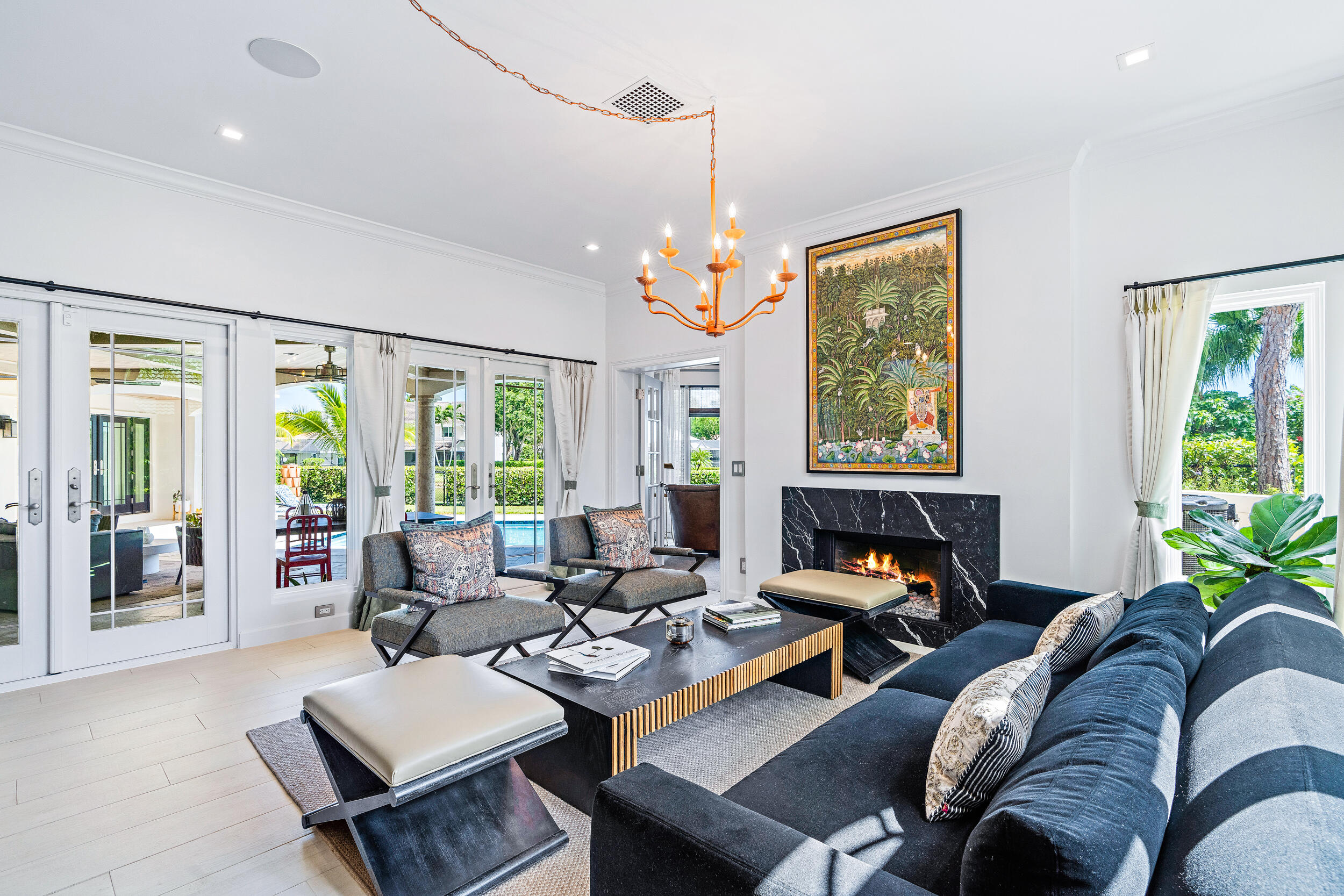 3 Sheldrake Circle Palm Beach Gardens, FL 33418 - Photo 17 of 48 a living room with furniture and a large window