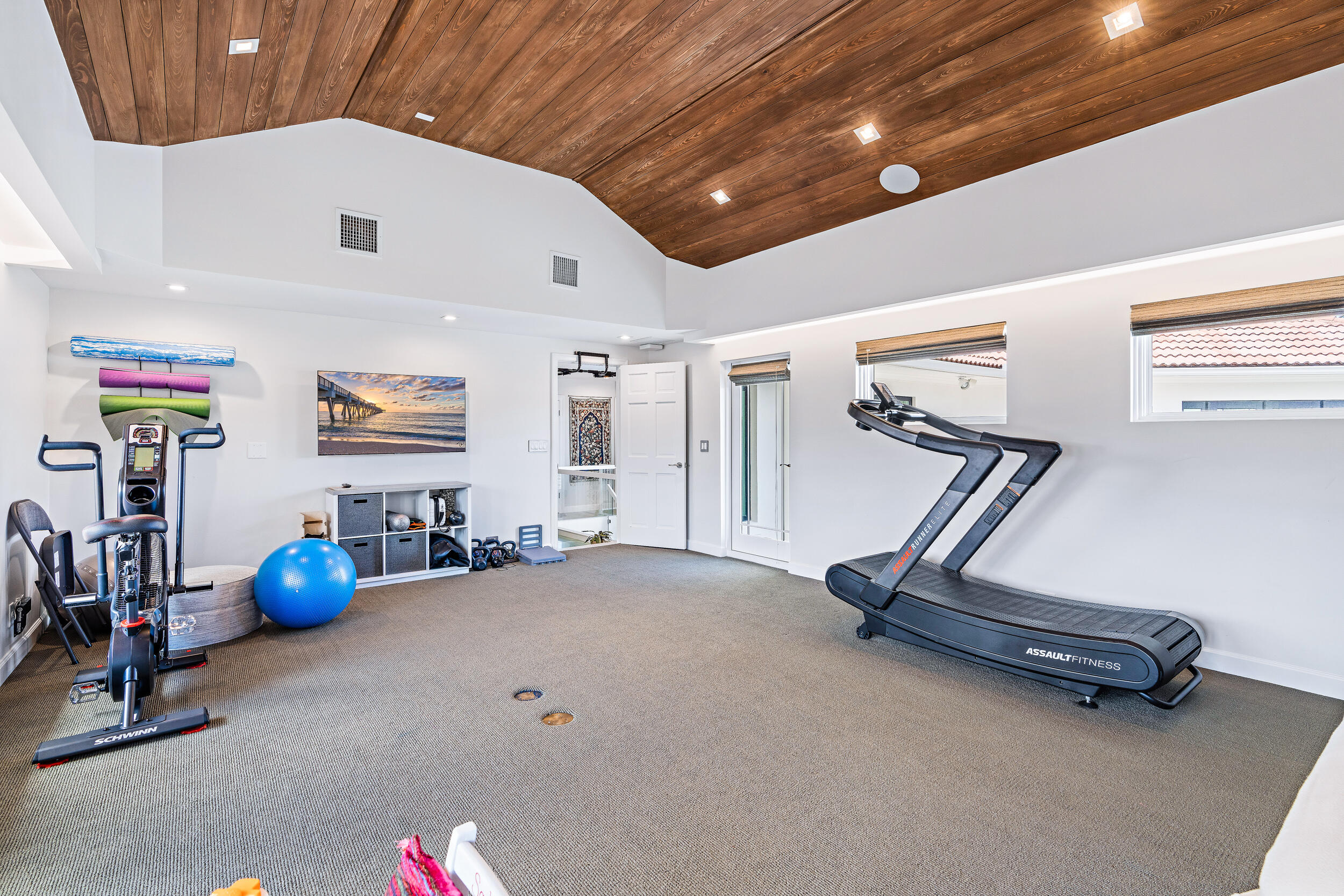3 Sheldrake Circle Palm Beach Gardens, FL 33418 - Photo 18 of 48 a view of a room with gym equipment