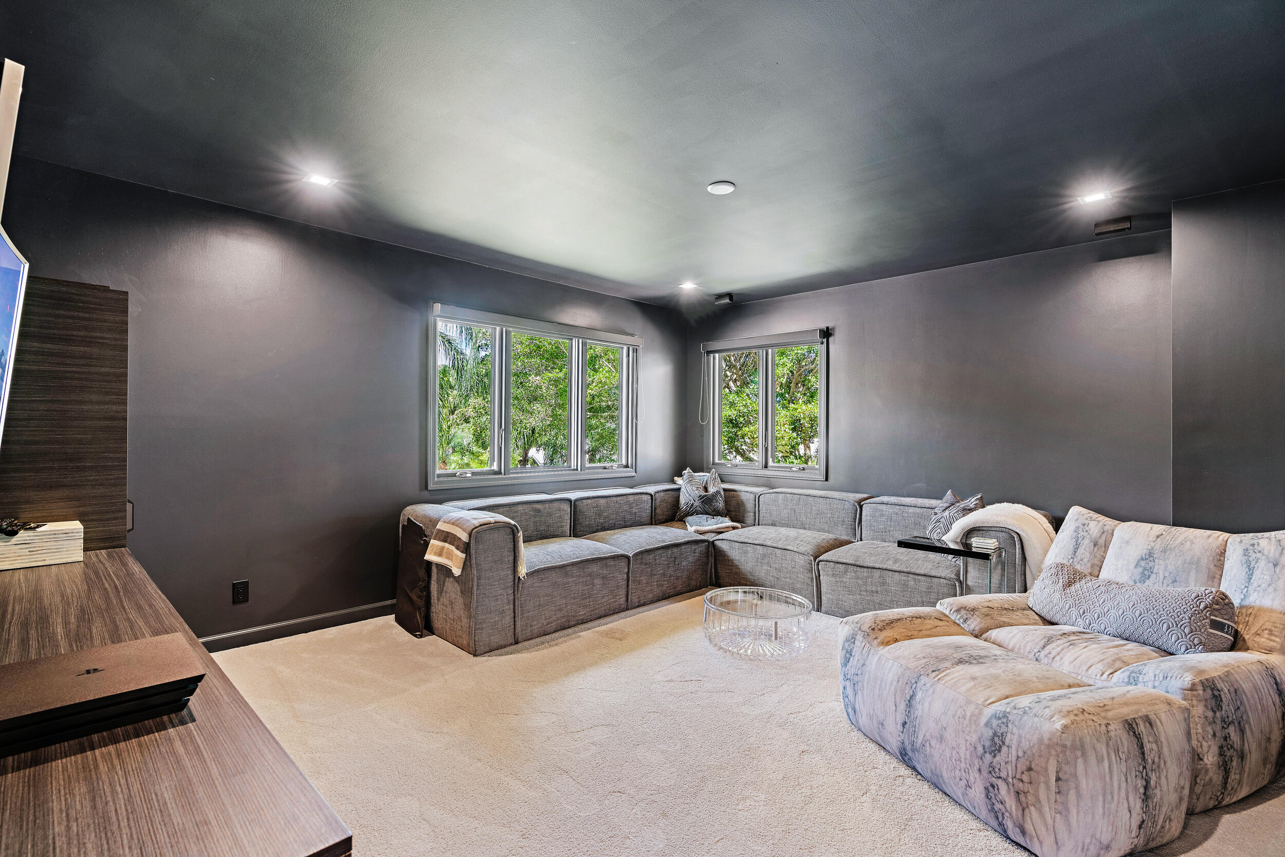 3 Sheldrake Circle Palm Beach Gardens, FL 33418 - Photo 23 of 48 a living room with furniture and a window