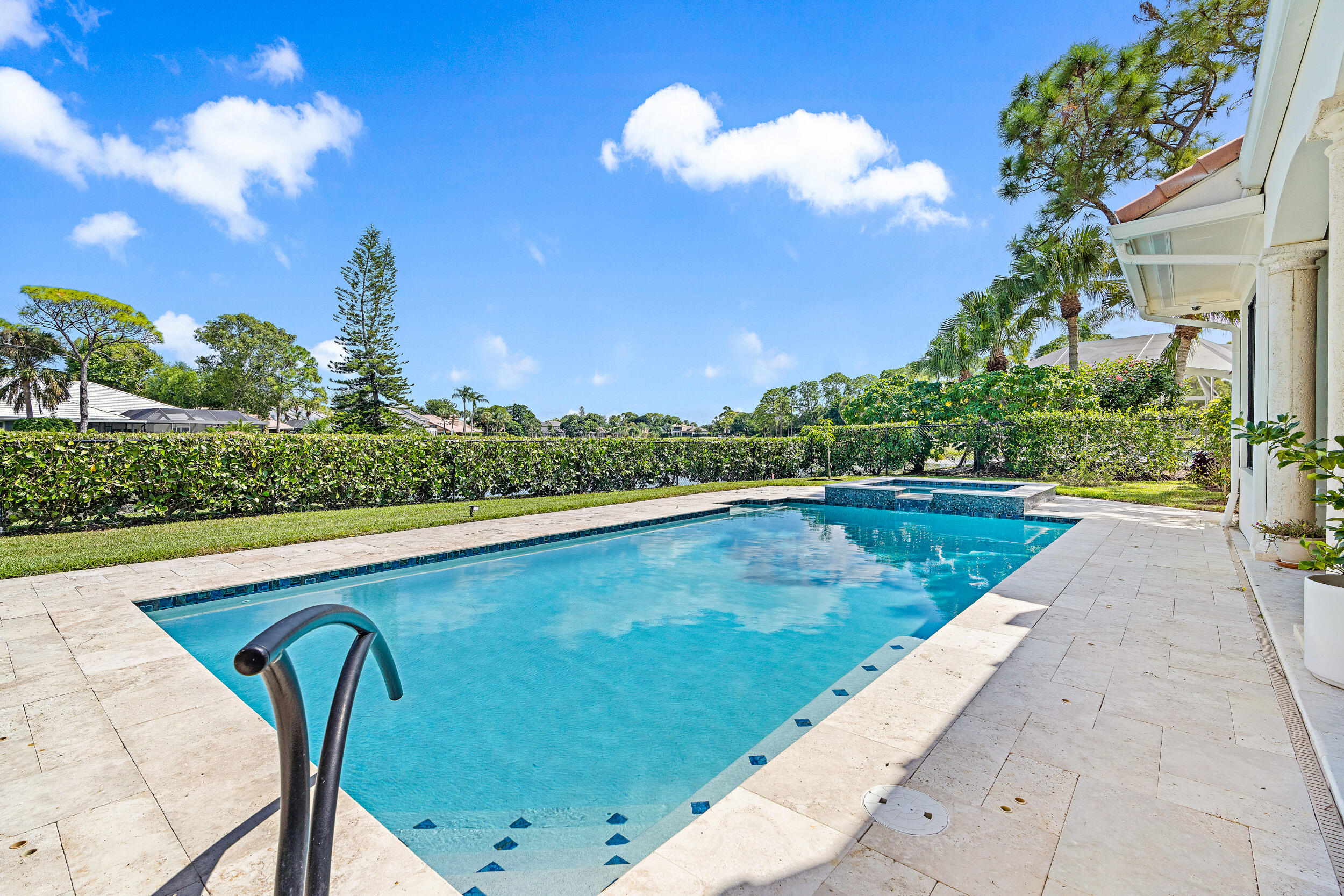 3 Sheldrake Circle Palm Beach Gardens, FL 33418 - Photo 28 of 48 a view of swimming pool from a balcony