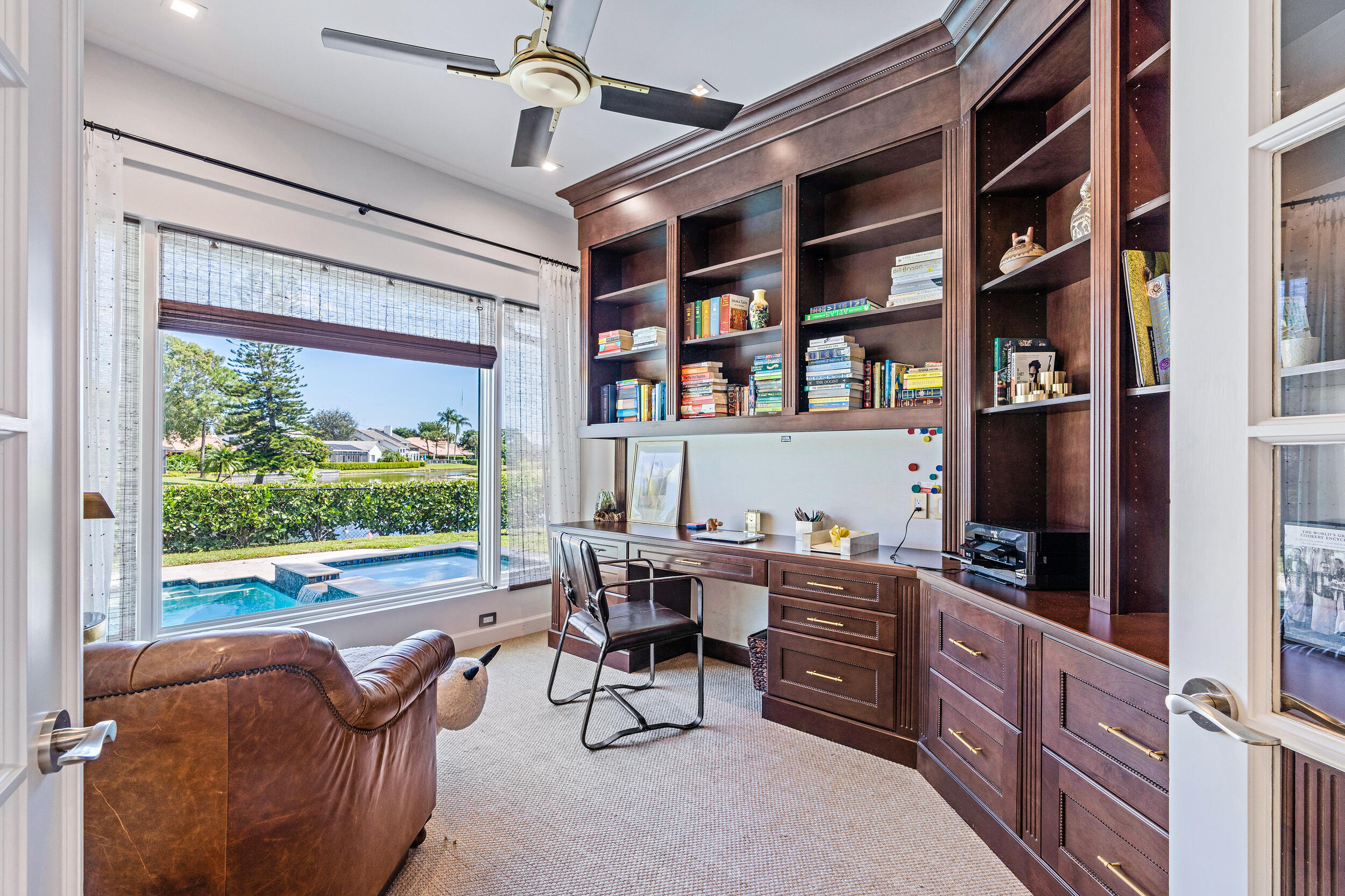 3 Sheldrake Circle Palm Beach Gardens, FL 33418 - Photo 33 of 48 a reading room with furniture and a flat screen tv