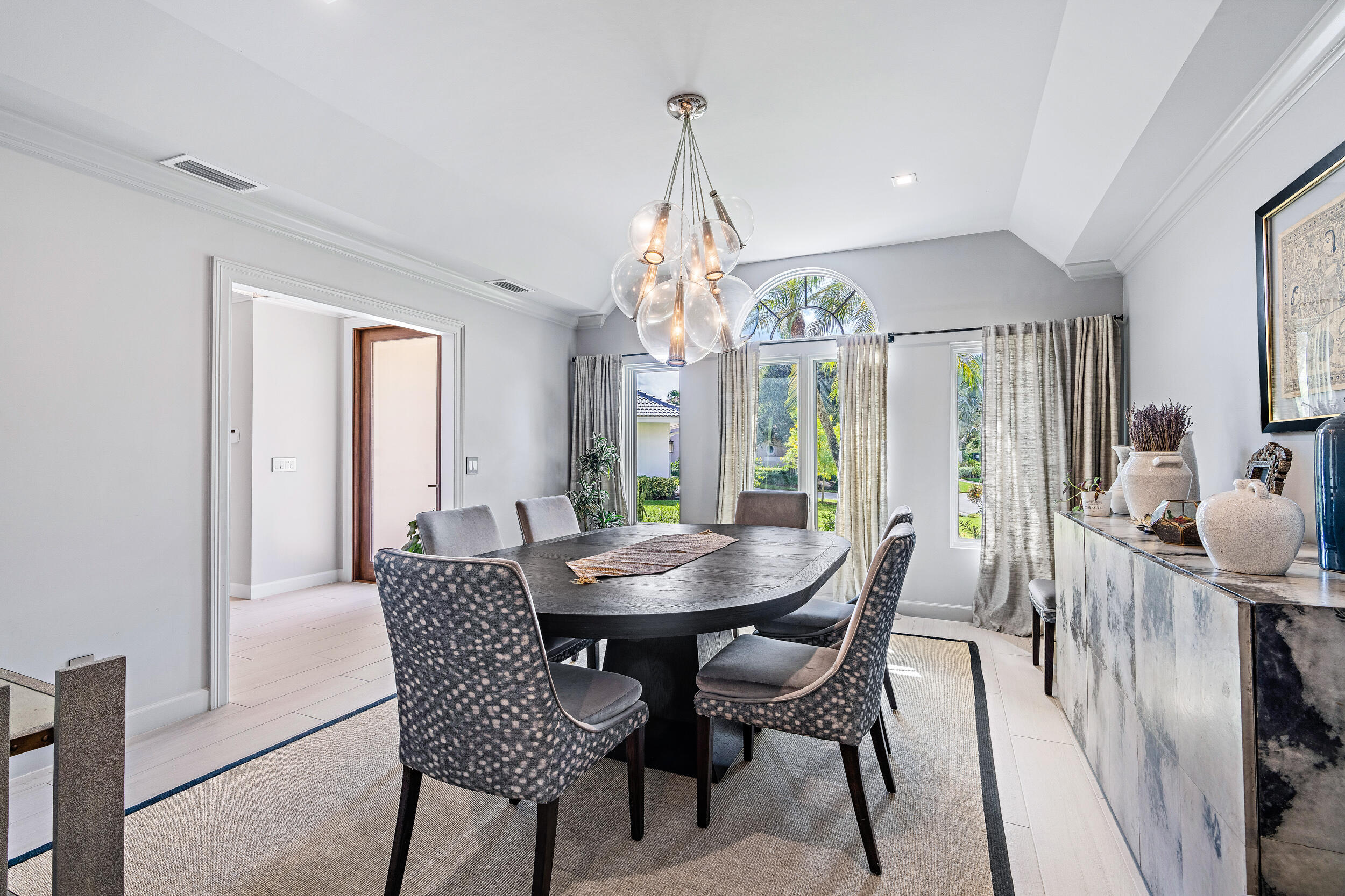 3 Sheldrake Circle Palm Beach Gardens, FL 33418 - Photo 36 of 48 a view of a a dining room with furniture window and wooden floor