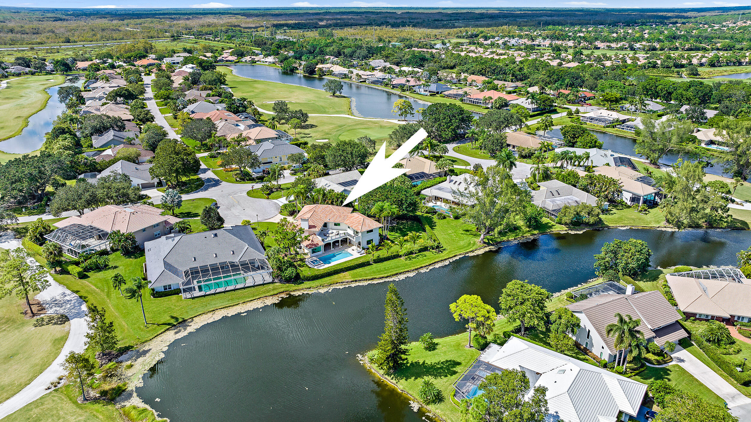 3 Sheldrake Circle Palm Beach Gardens, FL 33418 - Photo 45 of 48 a view of a lake with a lake