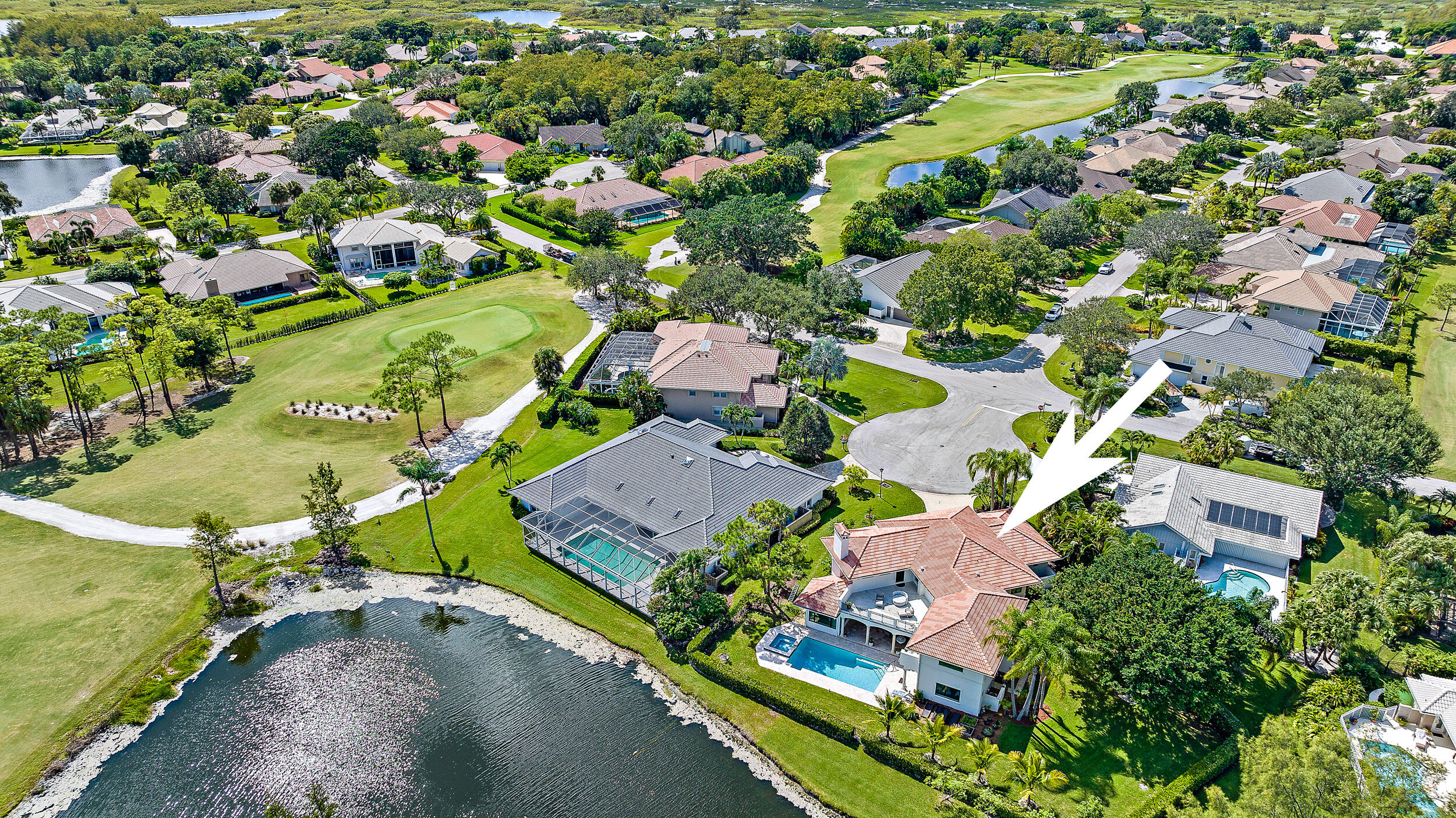 3 Sheldrake Circle Palm Beach Gardens, FL 33418 - Photo 47 of 48 an aerial view of a house with a garden