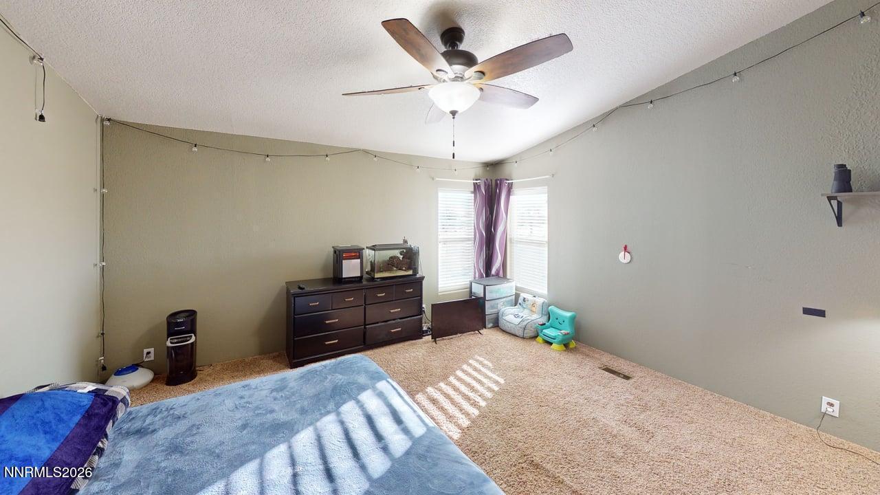 7430 West Rose Creek Road Winnemucca, NV 89445 - Photo 14 of 24 7430-W-Rose-Creek-Rd-Bedroom 4