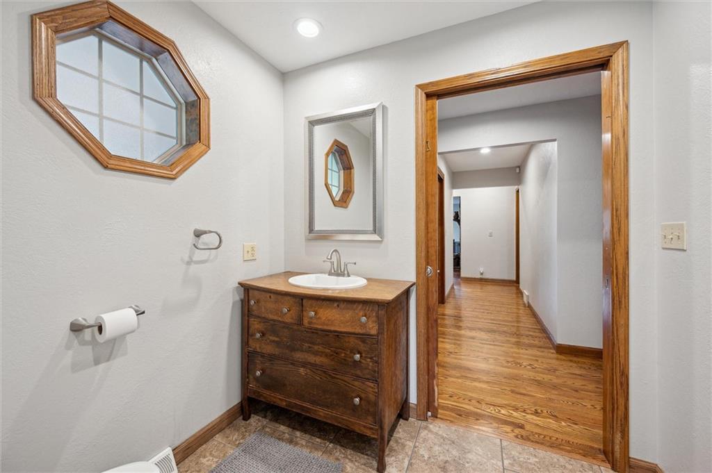160 Cornman Road Templeton, PA 16259 - Photo 23 of 50 a bathroom with a sink and a mirror
