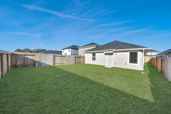 a view of a backyard with a garden