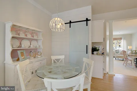 a view of dining room and wooden floor