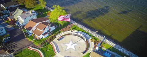 a view of a road with trees in the background