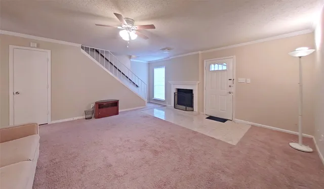 wooden floor and an empty room with a ceiling fan