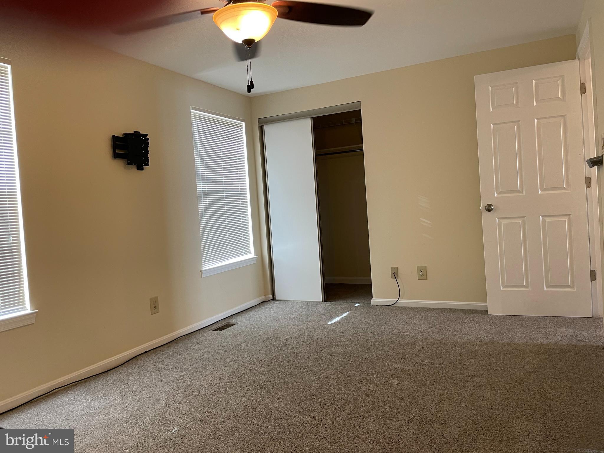 12405 Gooderham Way Gaithersburg, MD 20878 - Photo 16 of 31 a view of an empty room with a window
