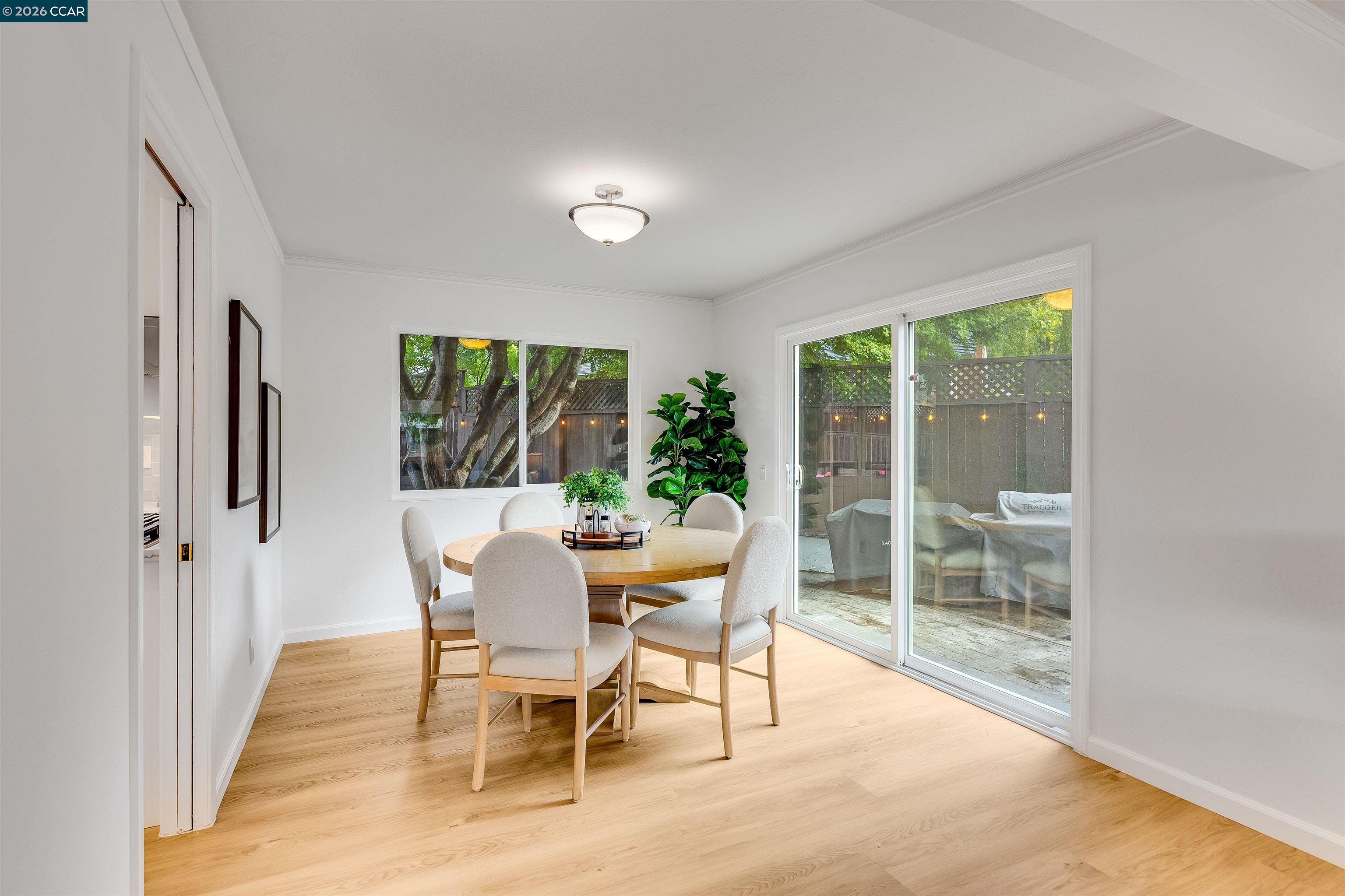 418 Devon Court San Ramon, CA 94583 - Photo 10 of 62 a view of a dining room with furniture window and wooden floor