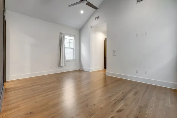 a view of entryway with stairs and wooden floor
