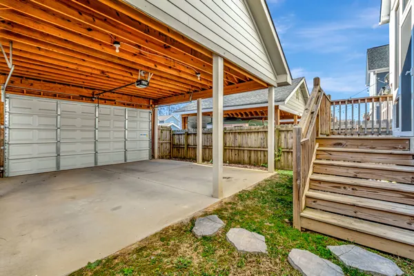 a view of a house with a snow in the yard