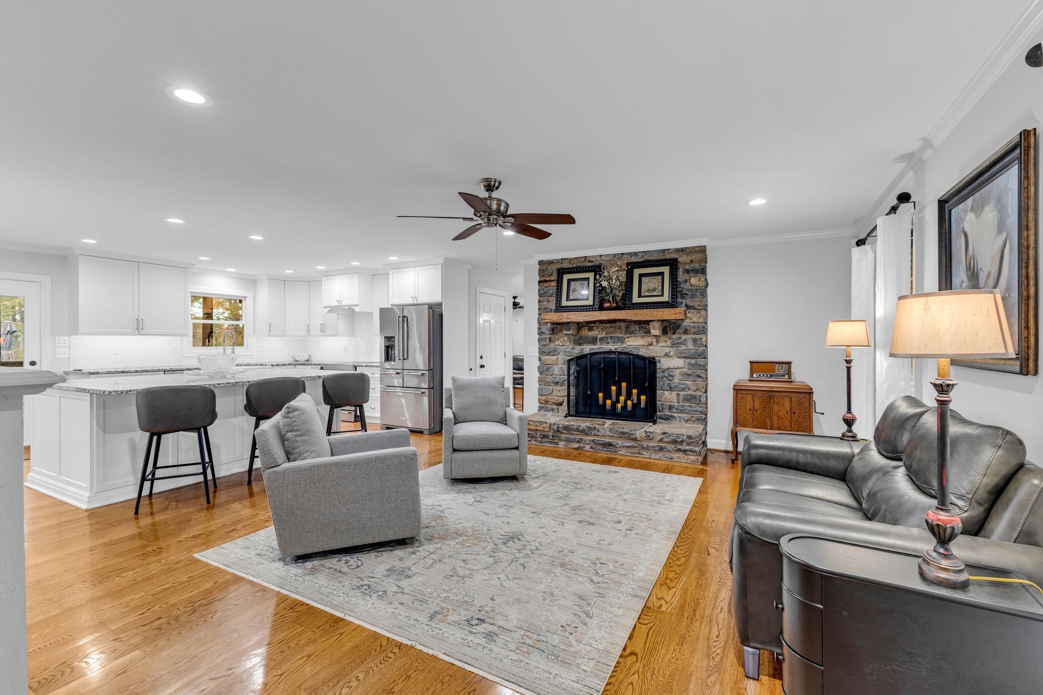 2058 Kidd Road Nolensville, TN 37135 - Photo 11 of 63 a living room with furniture and a fireplace