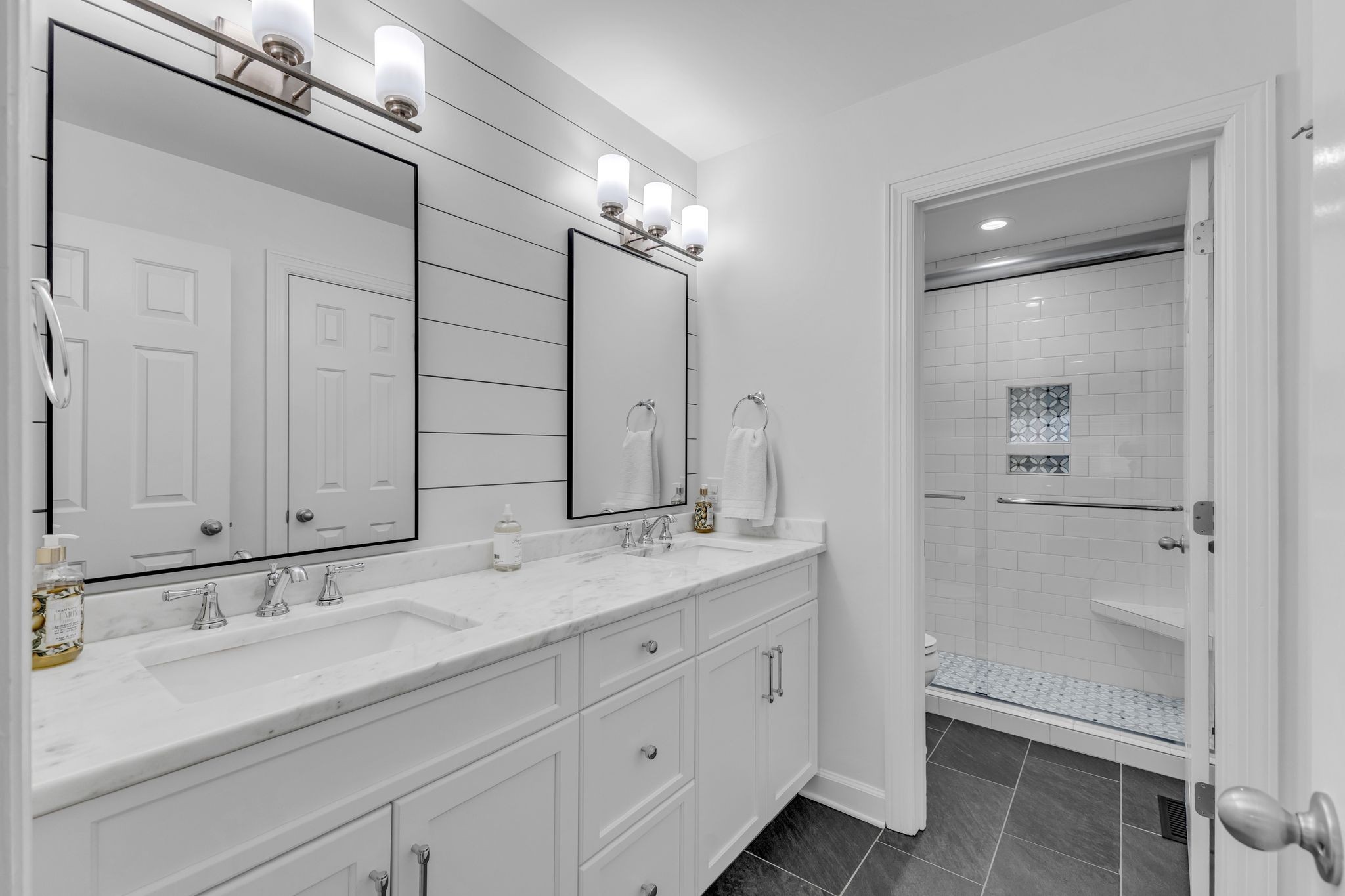 2058 Kidd Road Nolensville, TN 37135 - Photo 27 of 63 a bathroom with a sink double vanity and a mirror