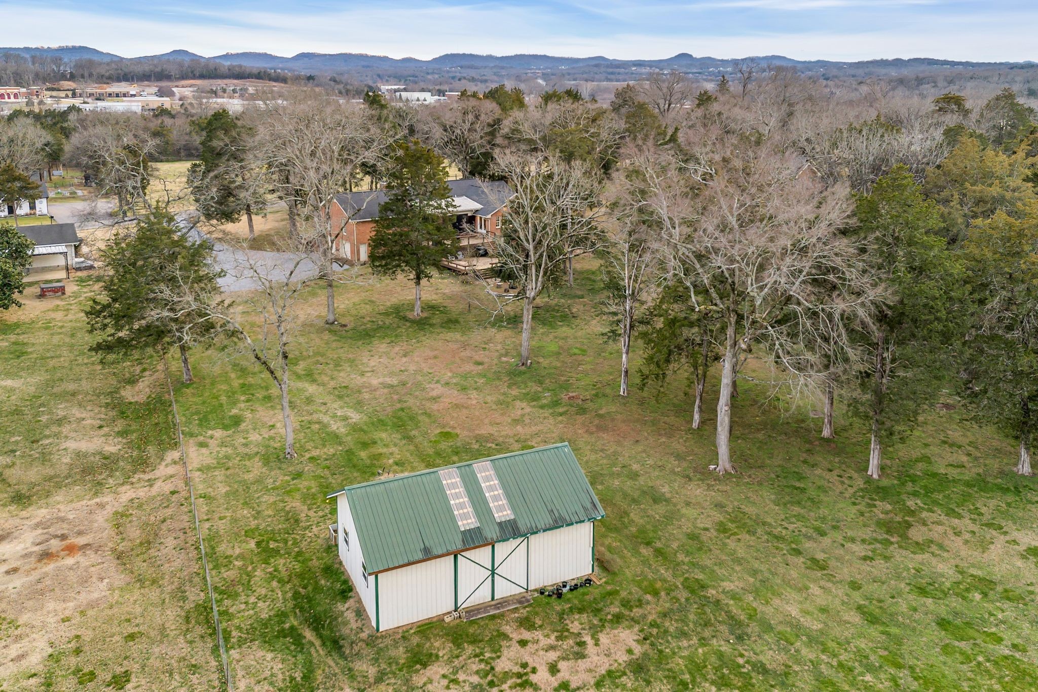 2058 Kidd Road Nolensville, TN 37135 - Photo 48 of 63 a view of a forest with a mountain