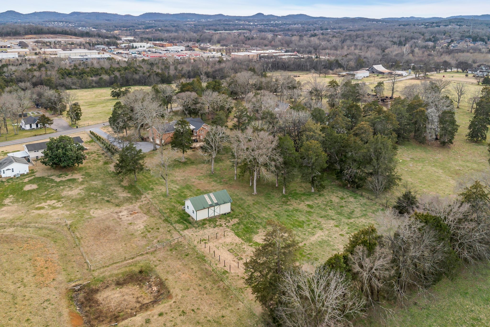 2058 Kidd Road Nolensville, TN 37135 - Photo 49 of 63 a view of a lake with mountains in the background