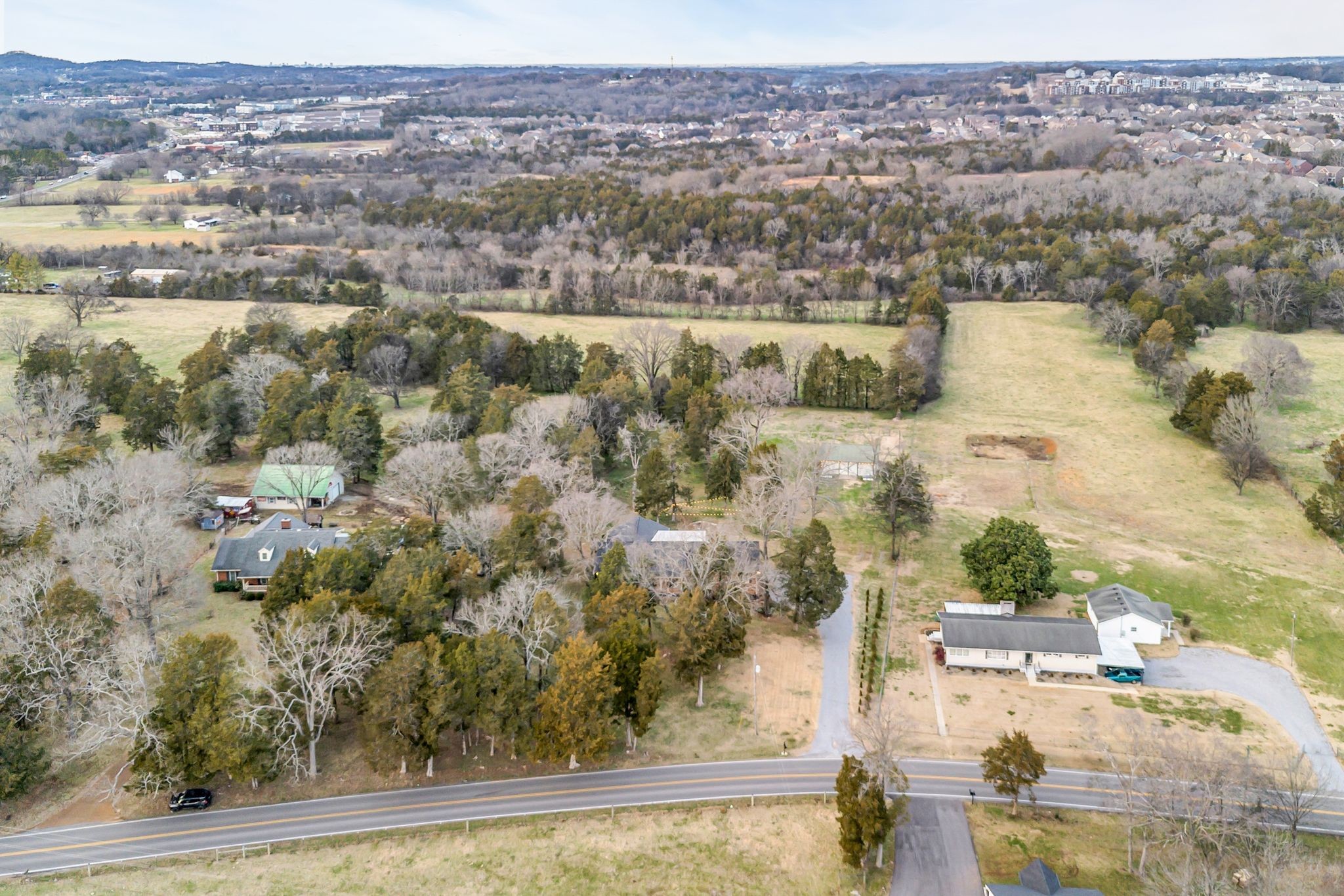 2058 Kidd Road Nolensville, TN 37135 - Photo 60 of 63 an aerial view of residential houses with outdoor space