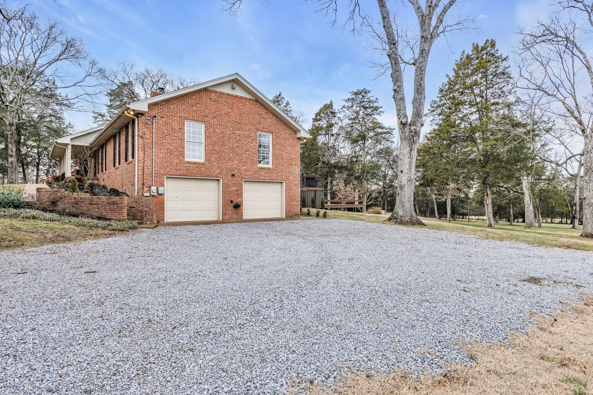 2058 Kidd Road Nolensville, TN 37135 - Photo 7 of 63 a front view of a house with a yard and garage