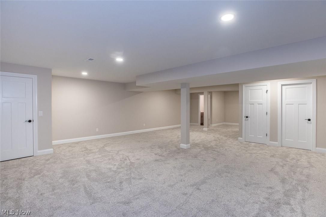 34286 Brookside Lane North Ridgeville, OH 44039 - Photo 47 of 50 Finished below grade area featuring light colored carpet and recessed lighting