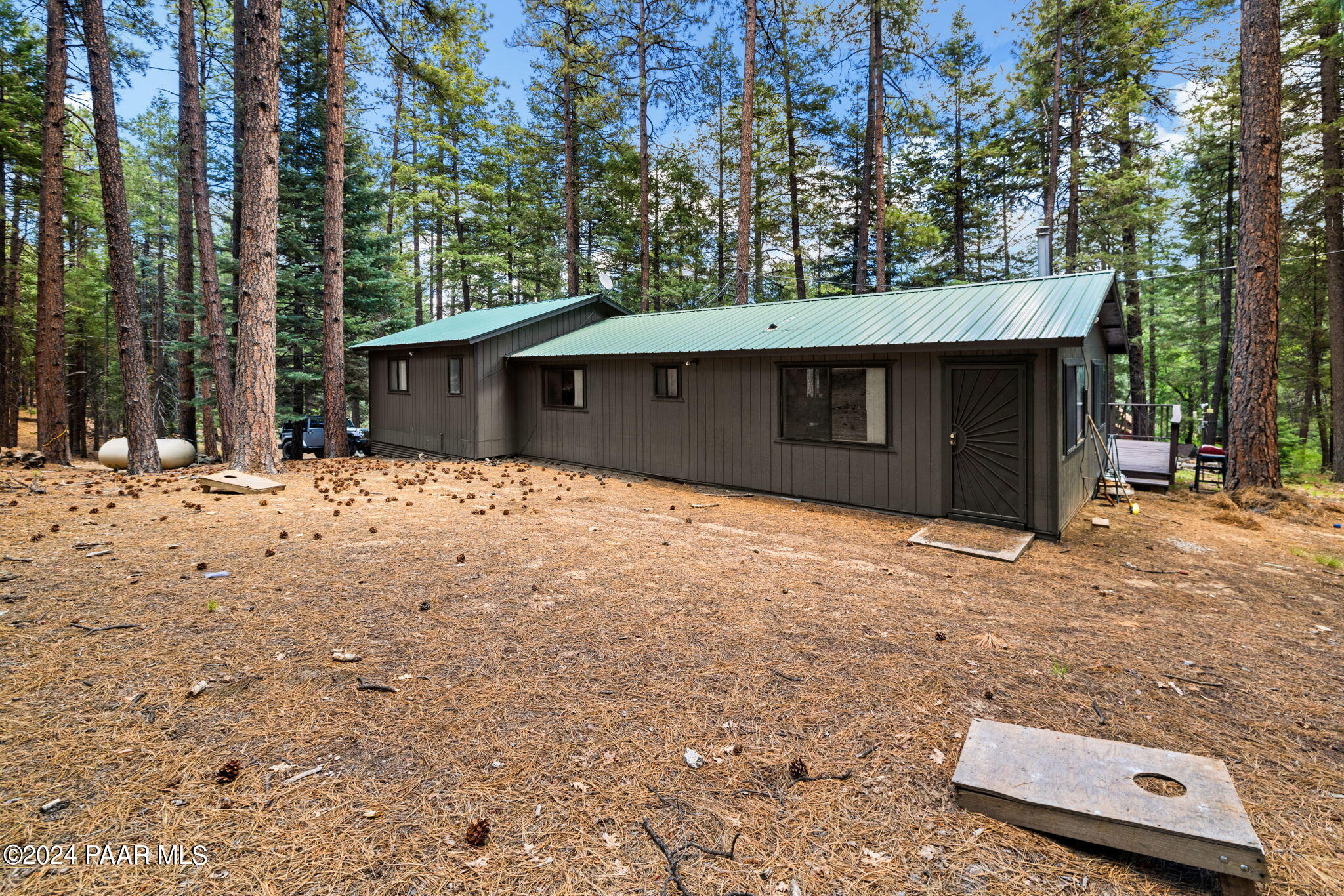 2695 Big 4 Road Prescott, AZ 86303 - Photo 21 of 25 a front view of a house with a yard