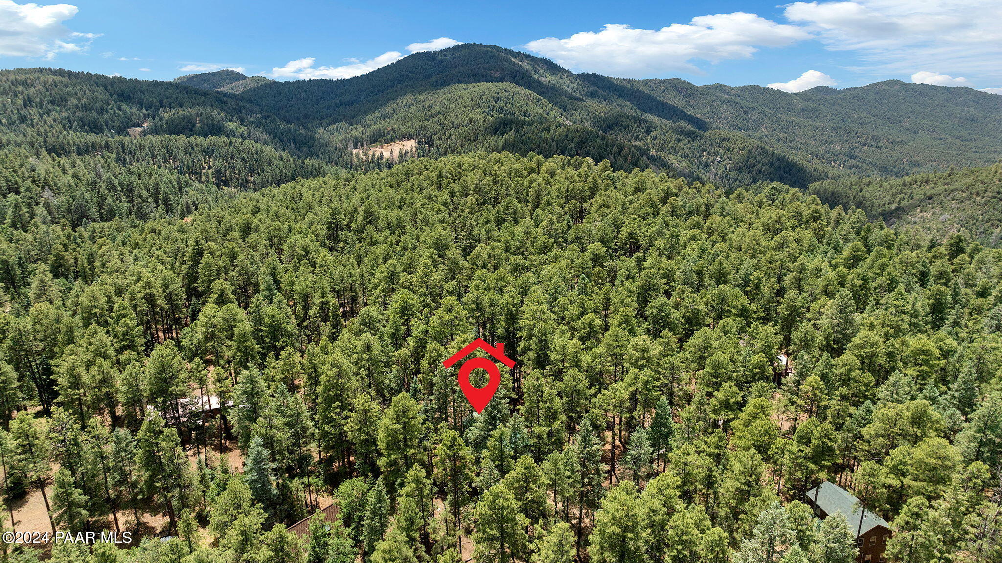 2695 Big 4 Road Prescott, AZ 86303 - Photo 25 of 25 a aerial view of a houses with a lush green hillside