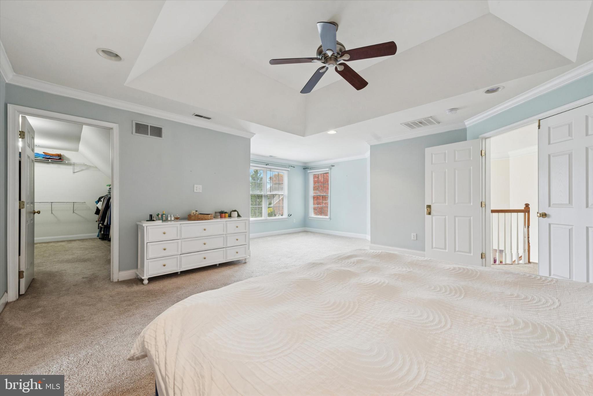 103 Palsgrove Way Chester Springs, PA 19425 - Photo 20 of 35 a bedroom with a bed and a chandelier