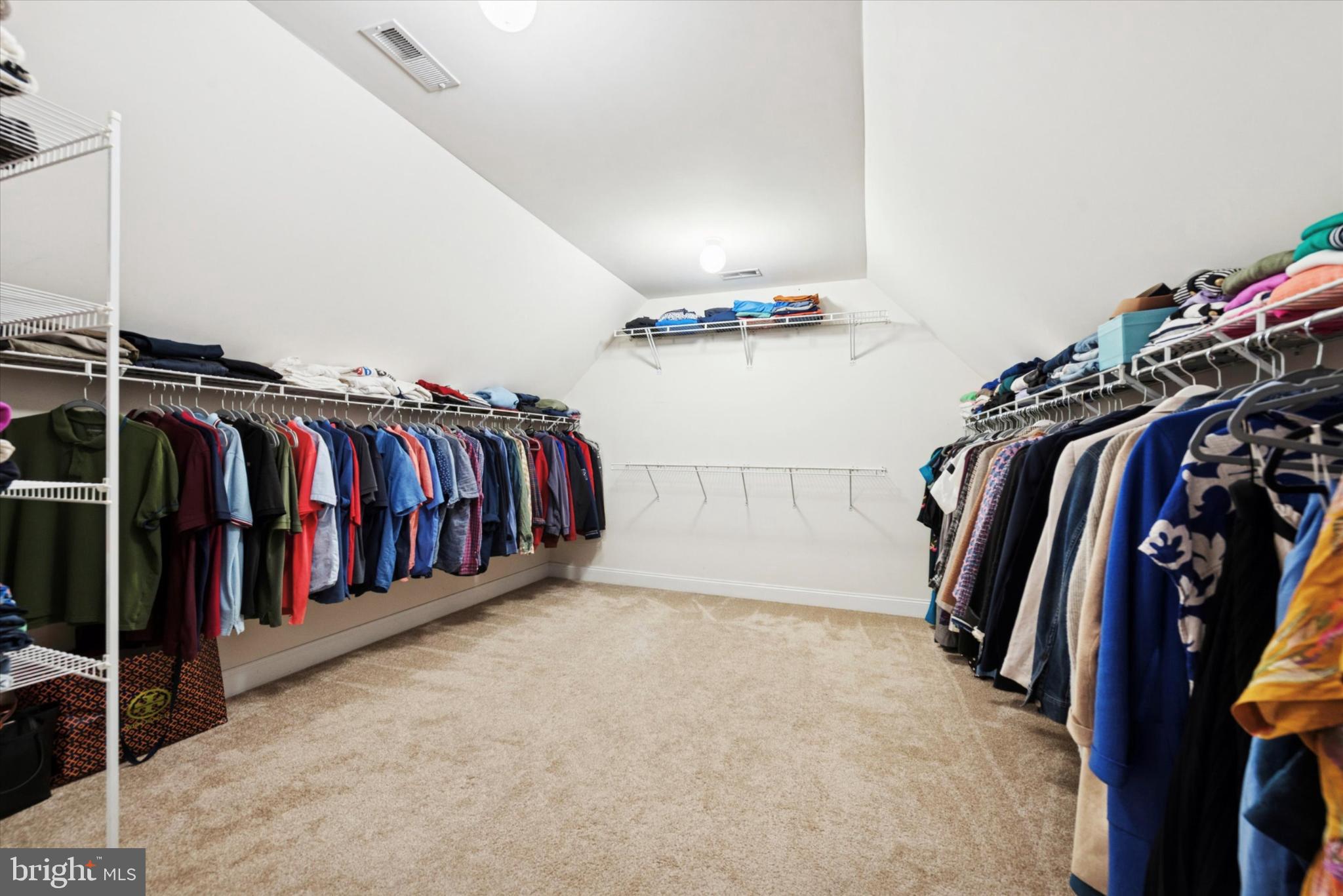 103 Palsgrove Way Chester Springs, PA 19425 - Photo 22 of 35 a view of walk in closet with clothes and shoes