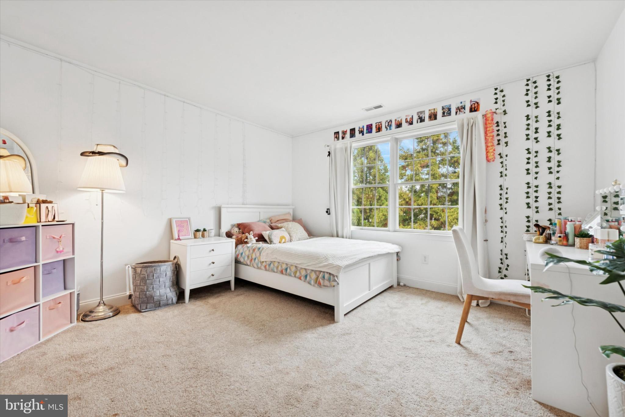103 Palsgrove Way Chester Springs, PA 19425 - Photo 24 of 35 a spacious bedroom with a bed and a window