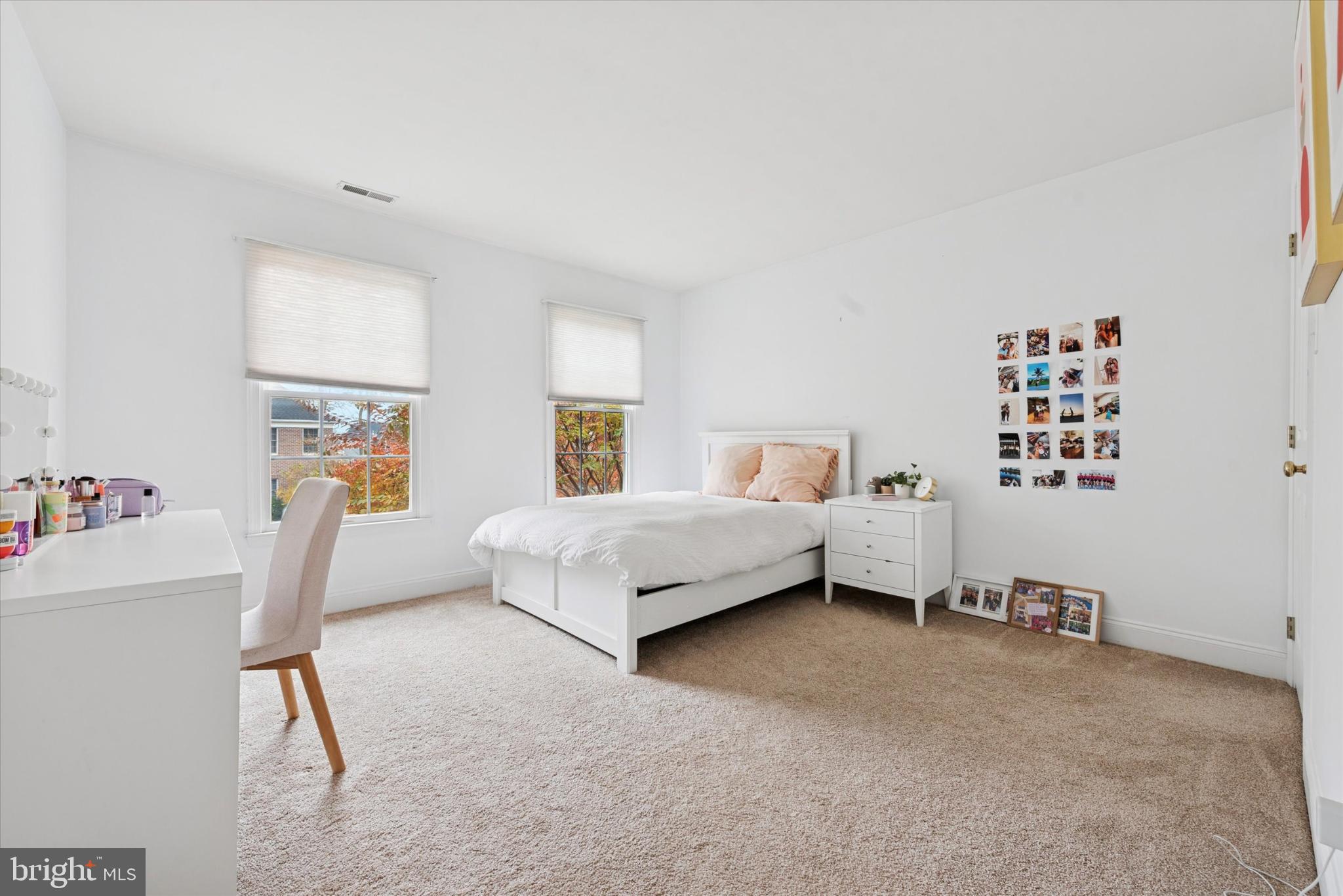 103 Palsgrove Way Chester Springs, PA 19425 - Photo 25 of 35 a bedroom with a bed and wooden floor