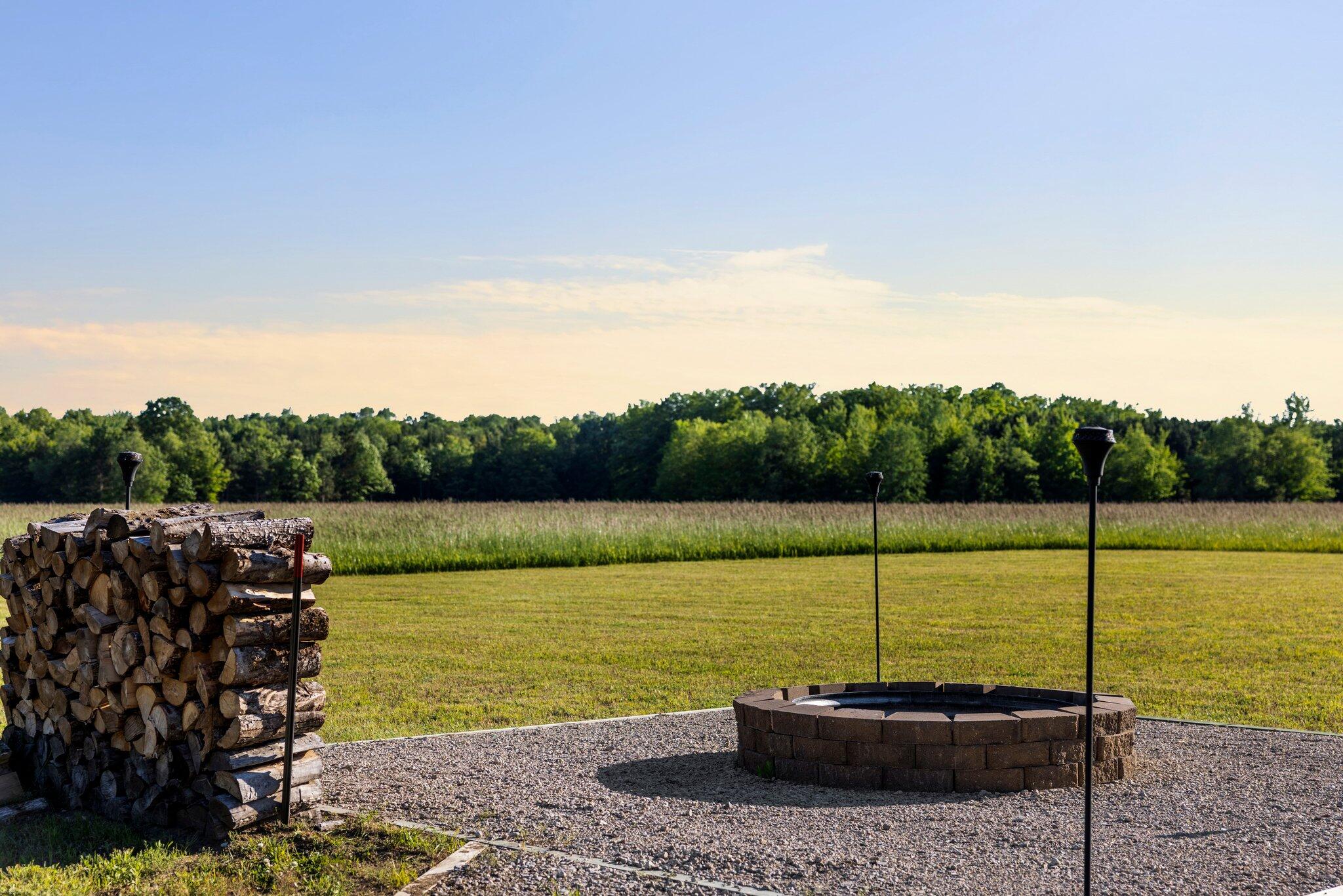 5859 Potter Road Onekama, MI 49675 - Photo 67 of 85 Firepit already in