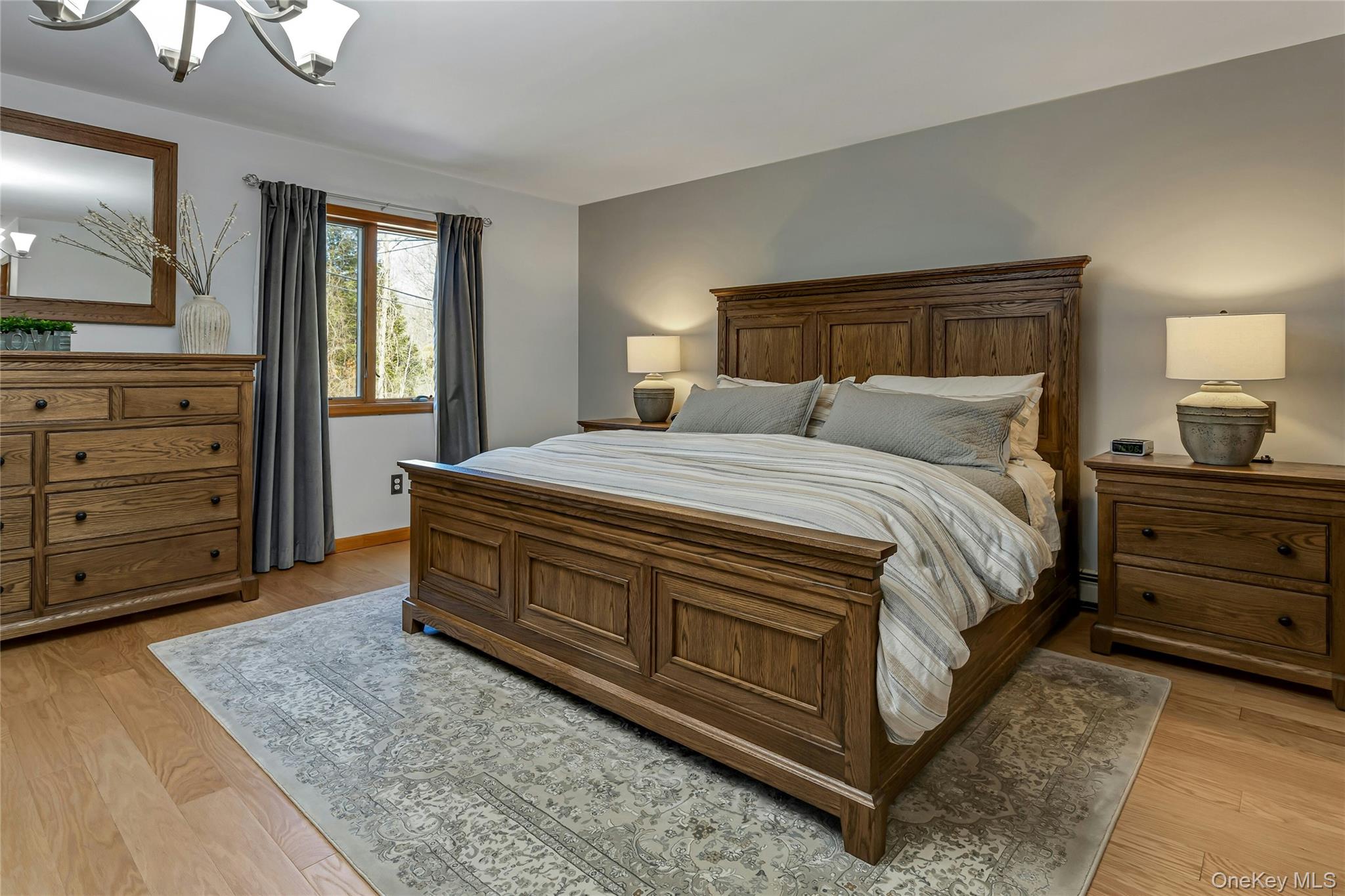 204 Cherry Hill Road Carmel, NY 10512 - Photo 15 of 36 a bedroom with a bed and a dresser