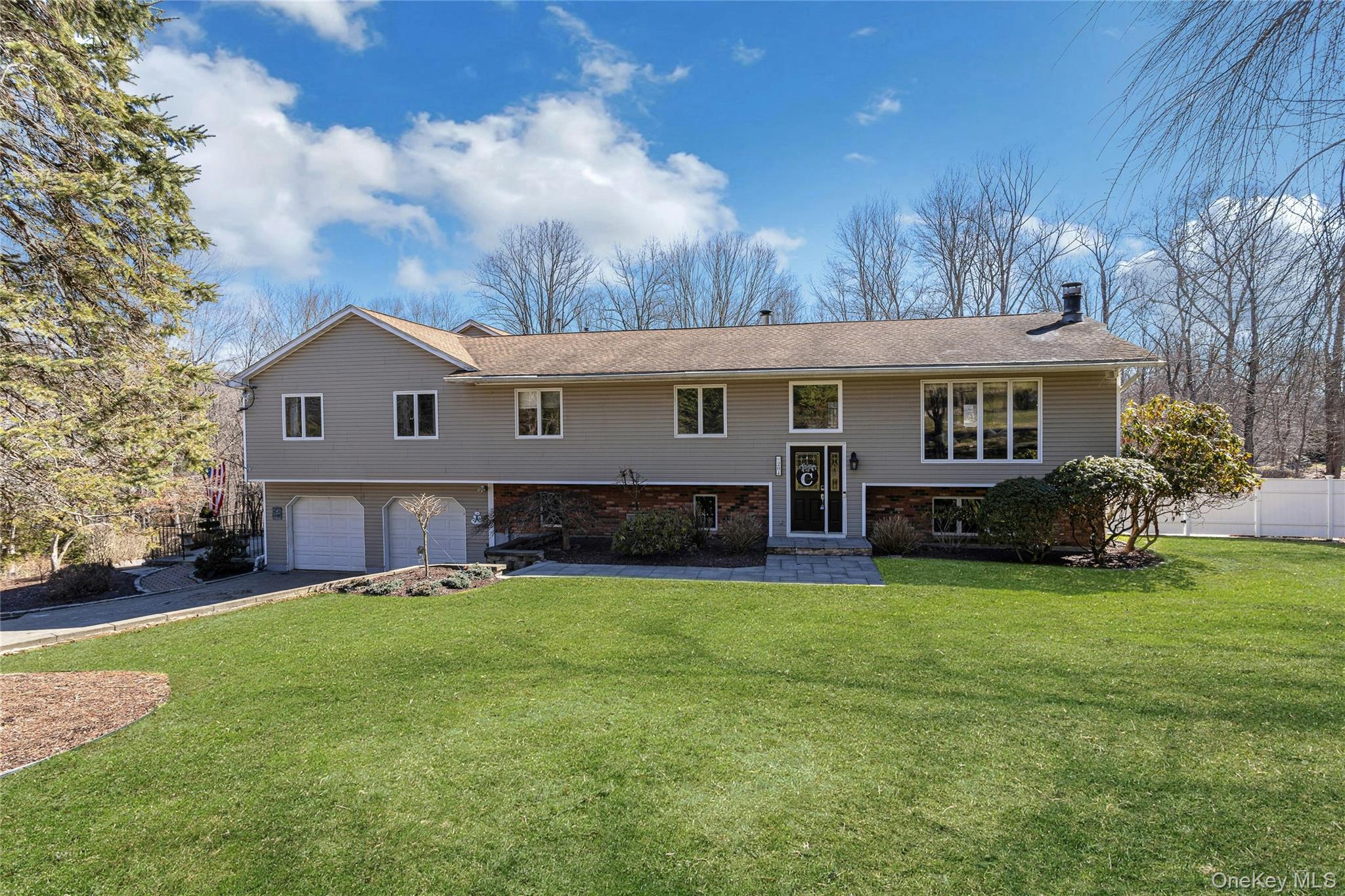 204 Cherry Hill Road Carmel, NY 10512 - Photo 2 of 36 a view of a house with a yard and sitting area