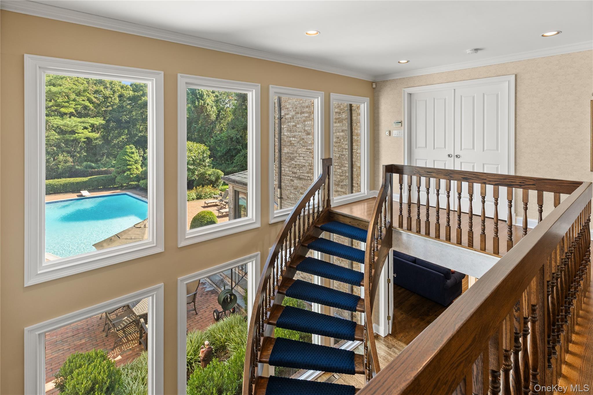 294 Half Hollow Road Dix Hills, NY 11746 - Photo 20 of 44 a view of an entryway with wooden floor and stairs