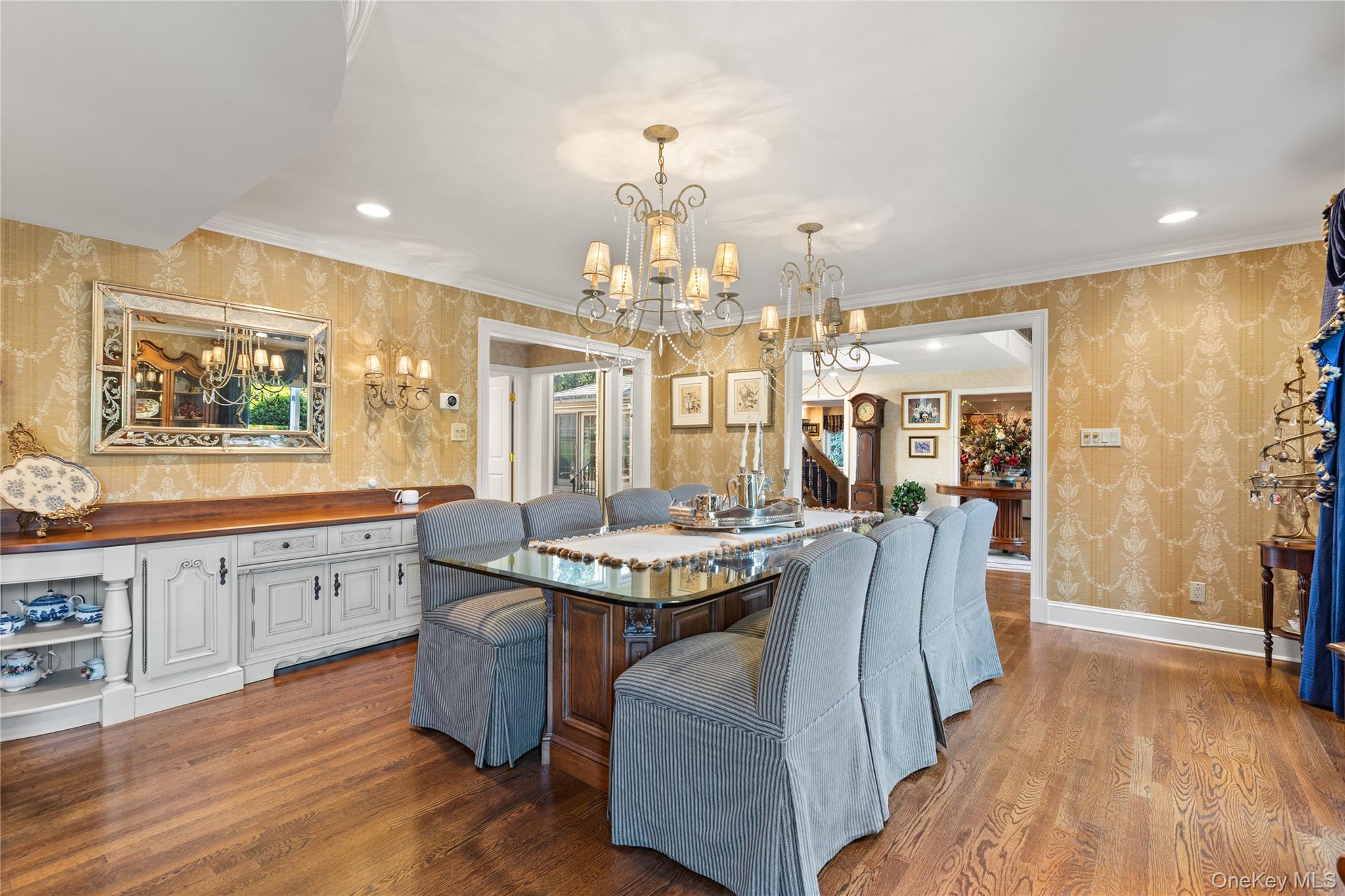 294 Half Hollow Road Dix Hills, NY 11746 - Photo 25 of 44 a large kitchen with a table and chairs