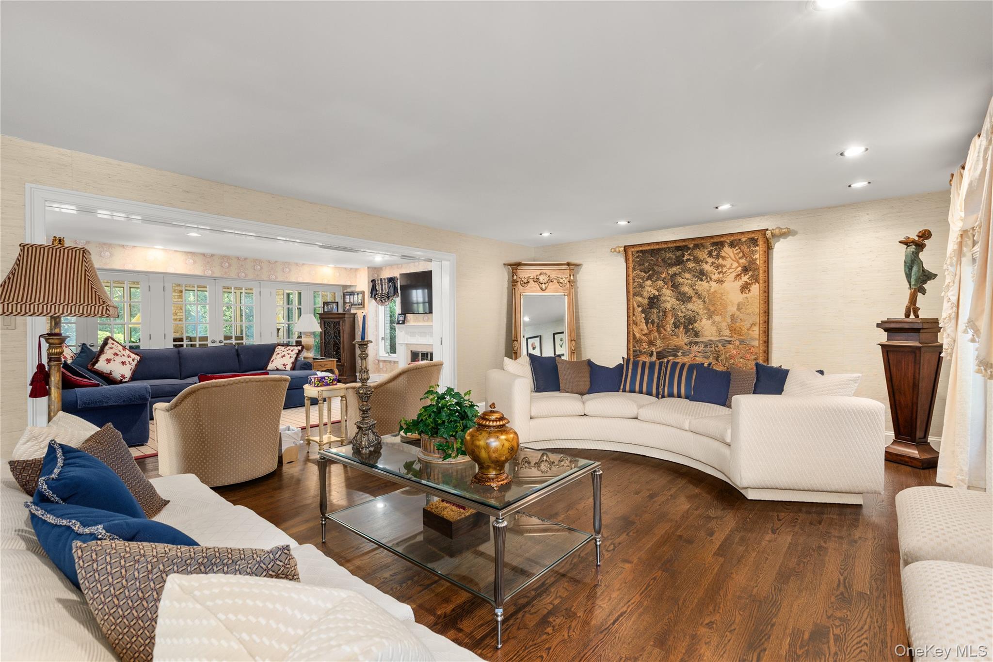 294 Half Hollow Road Dix Hills, NY 11746 - Photo 29 of 44 a living room with furniture and a large window
