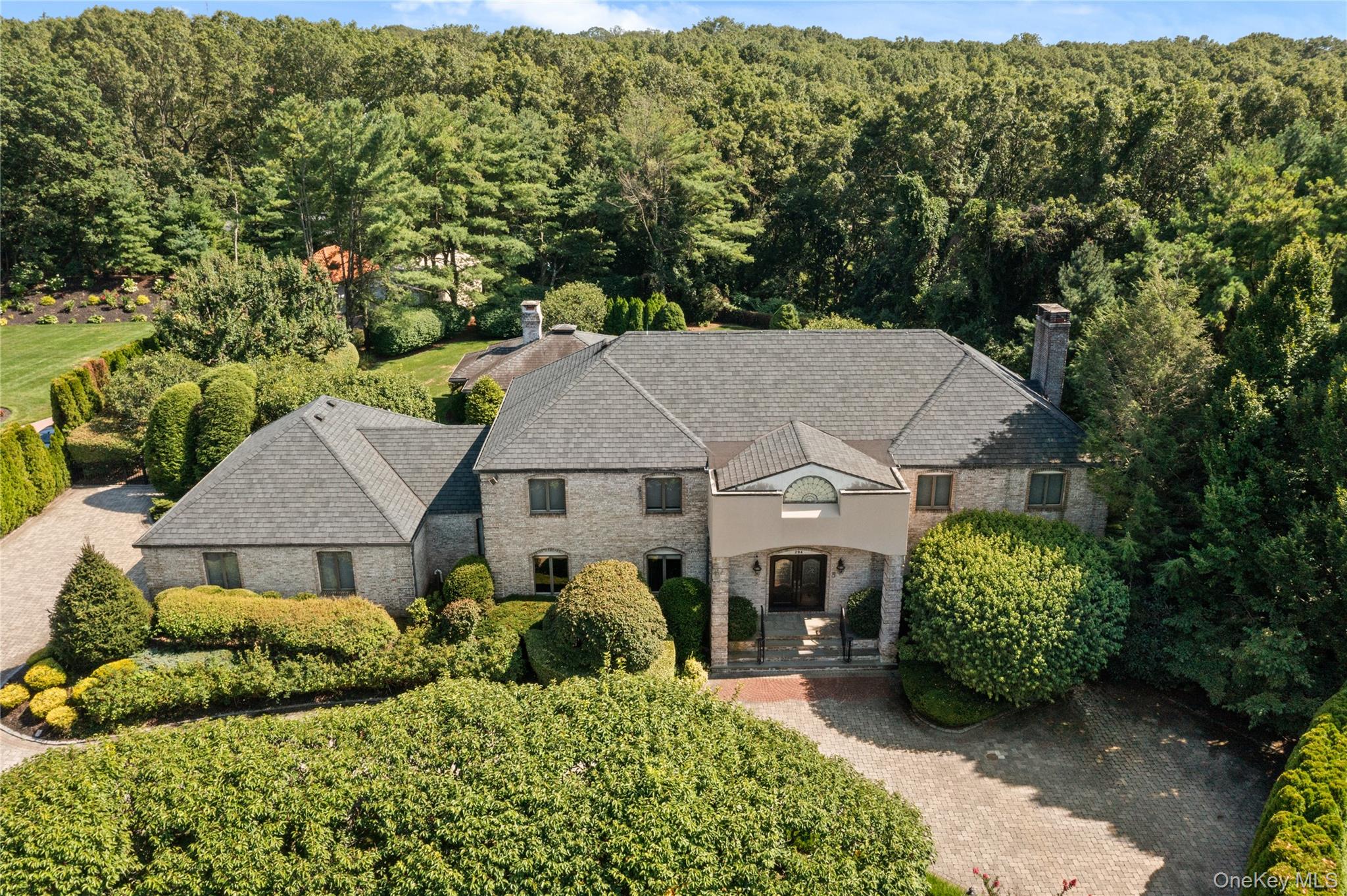 294 Half Hollow Road Dix Hills, NY 11746 - Photo 3 of 44 aerial view of a house with a garden