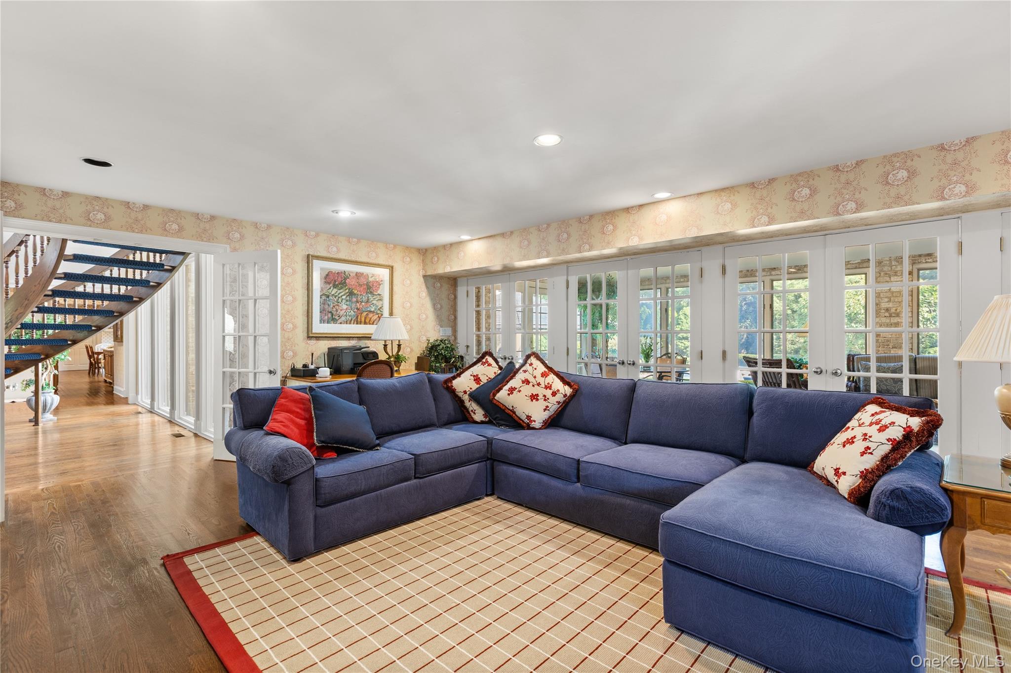 294 Half Hollow Road Dix Hills, NY 11746 - Photo 31 of 44 a living room with furniture and a wooden floor