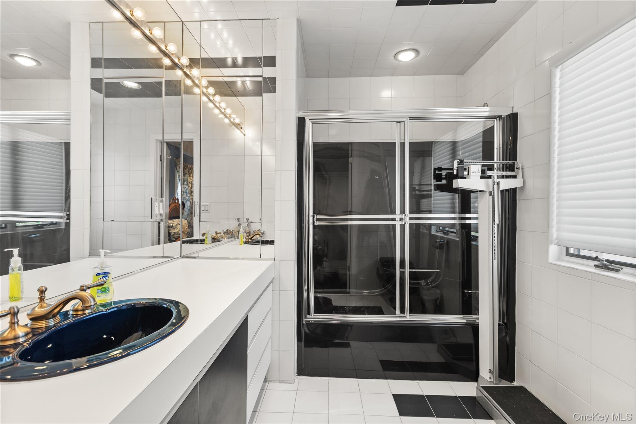 294 Half Hollow Road Dix Hills, NY 11746 - Photo 38 of 44 a kitchen with a sink and refrigerator