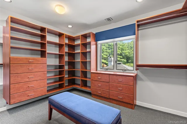 a room with furniture and a window