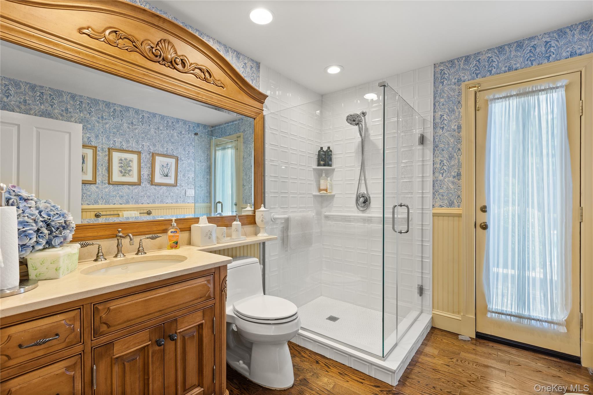 294 Half Hollow Road Dix Hills, NY 11746 - Photo 43 of 44 a bathroom with a sink a toilet and shower