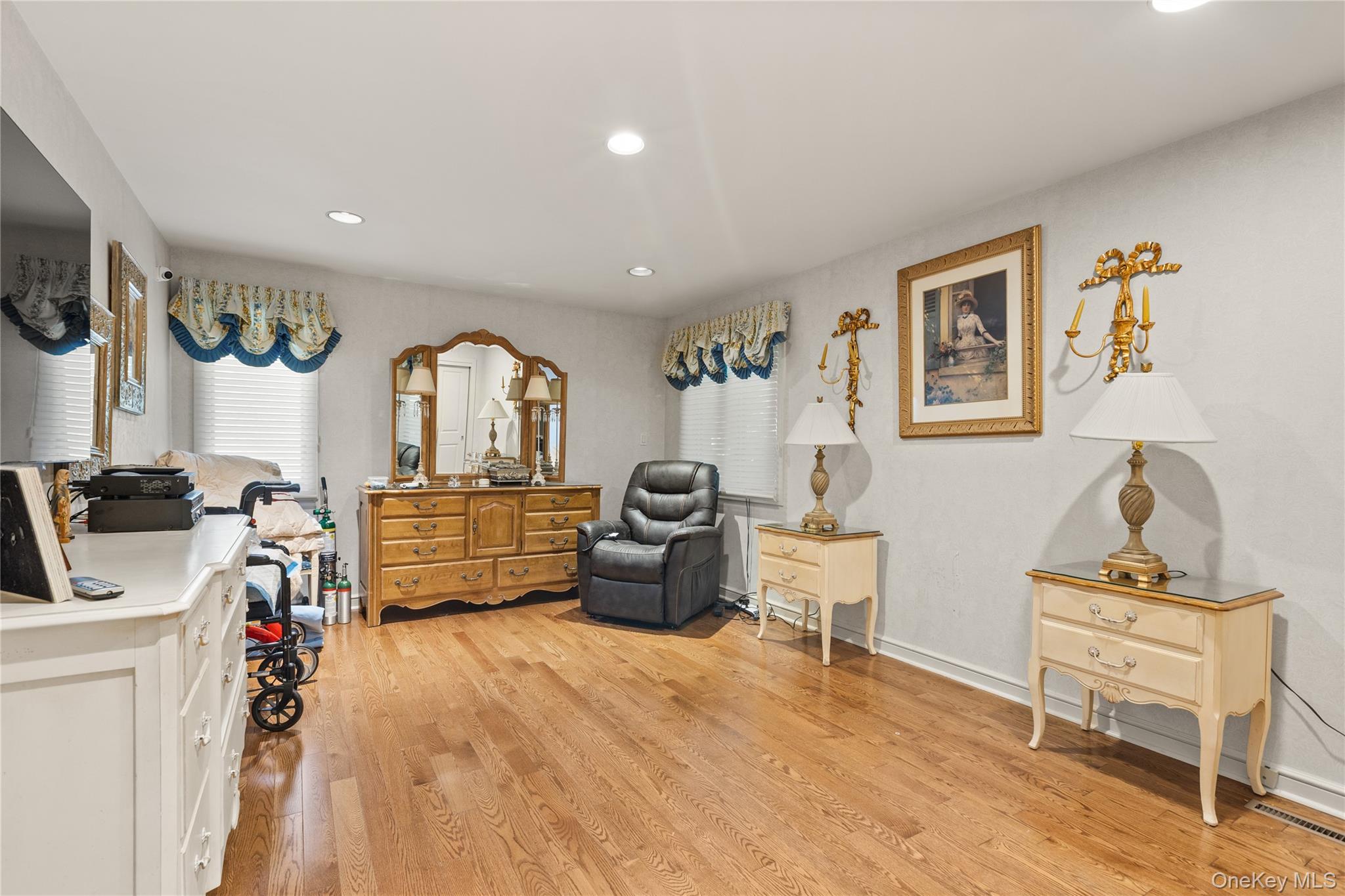 294 Half Hollow Road Dix Hills, NY 11746 - Photo 44 of 44 a living room with furniture and a wooden floor