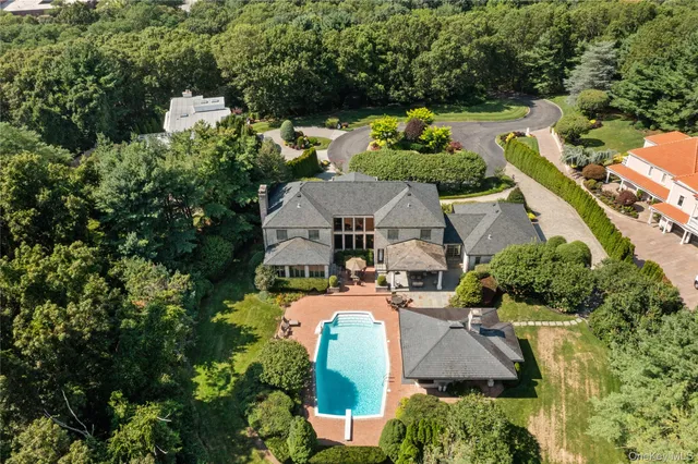 an aerial view of a house with a garden