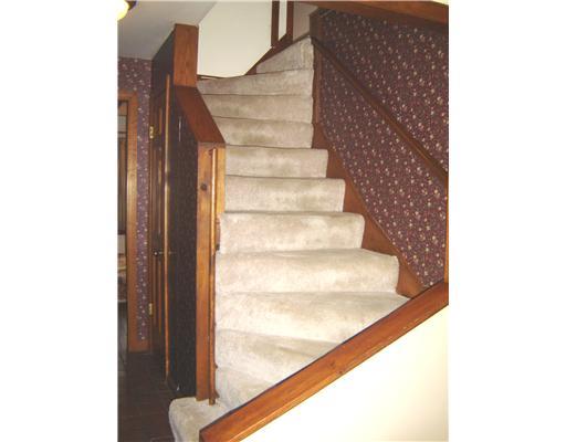 58 Shuster Road Gibsonia, PA 15044 - Photo 8 of 18 Entry/Foyer. This is an old fashioned winder staircase to the second floor.