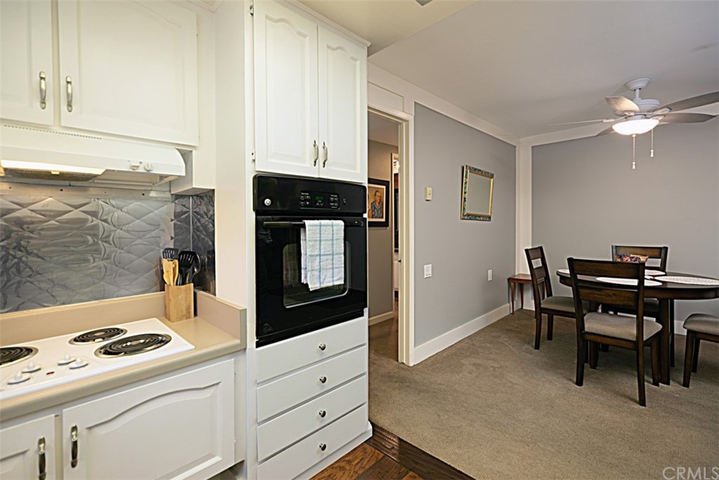 837 Ronda Sevilla, Unit P Laguna Woods, CA 92637 - Photo 16 of 31 HOA maintains oven, fan, cooktop and dishwasher for carefree living.
