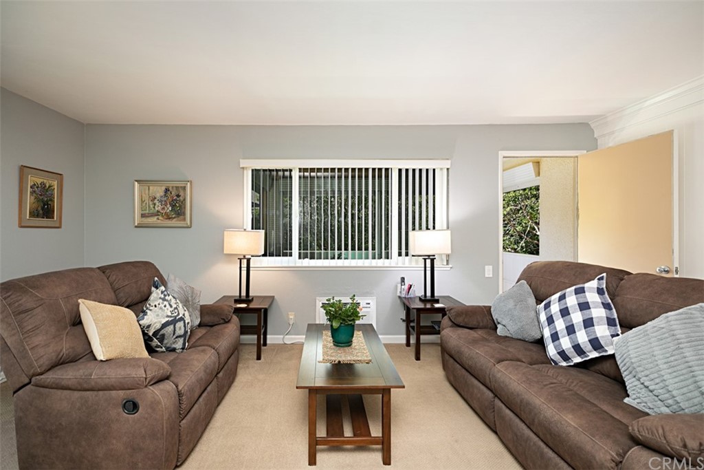 837 Ronda Sevilla, Unit P Laguna Woods, CA 92637 - Photo 4 of 31 Spacious living room for entertaining.