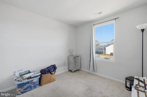 a room with furniture and a window