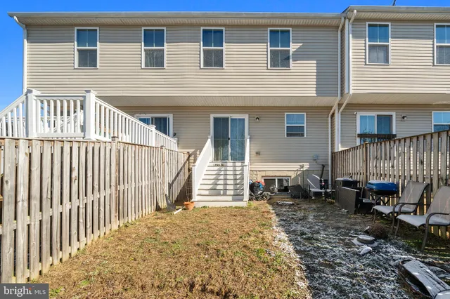 a front view of a house with a patio