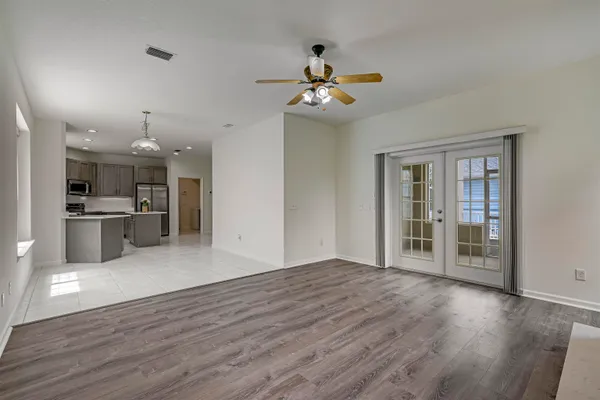 a view of empty room with windows